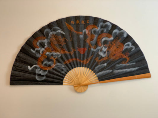 63-INCH EXTRA LARGE DECORATIVE WALL FAN — TWIN GOLDEN DRAGONS & FLAMING PEARL ON TEXTURED DARK CHARCOAL BACKGROUND