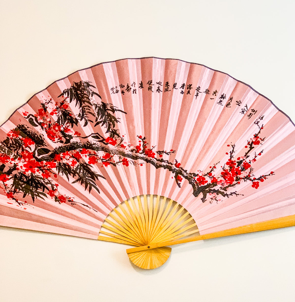 63-INCH EXTRA LARGE DECORATIVE WALL FAN — VIBRANT WINTER PLUM BLOSSOMS & INK BAMBOO ON BRIGHT PINK CANVAS